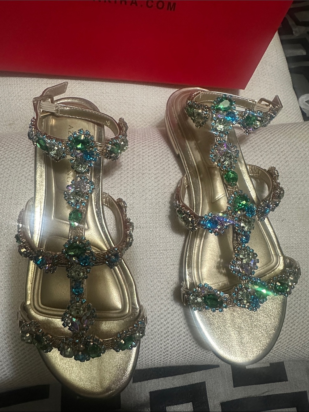 AKIRA Gold Jeweled T-Strap Sandals with Green and Blue Stones